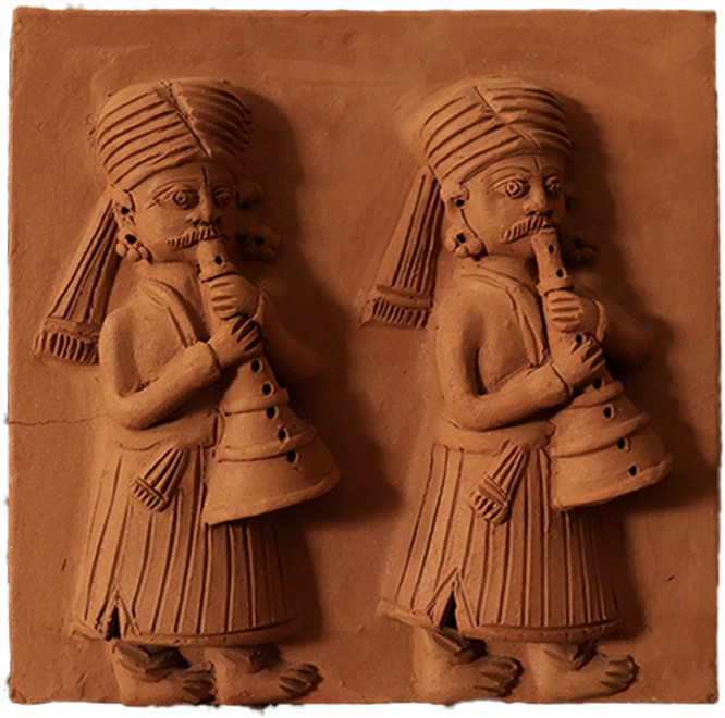 Representation of baajewale in Terracotta by Dinesh Molela