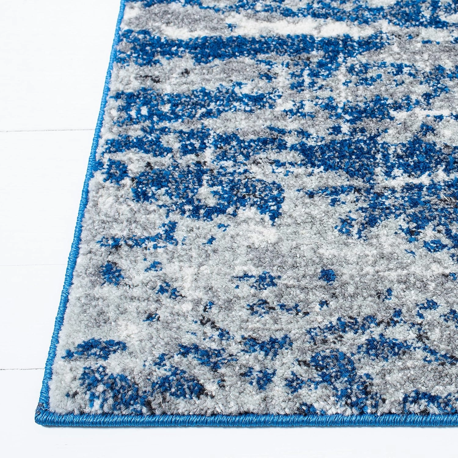 SAFAVIEH Evoke Collection Area Rug - 9' x 12', Dark Blue & Grey, Modern Abstract Design, Non-Shedding & Easy Care, Ideal for High Traffic Areas in Living Room, Bedroom (EVK272L)