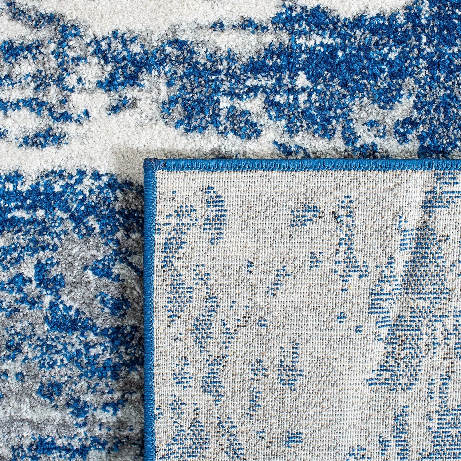 SAFAVIEH Evoke Collection Area Rug - 9' x 12', Dark Blue & Grey, Modern Abstract Design, Non-Shedding & Easy Care, Ideal for High Traffic Areas in Living Room, Bedroom (EVK272L)